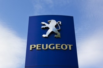 Ratingen, Germany - May 29, 2011: Peugeot sign at a car dealer's